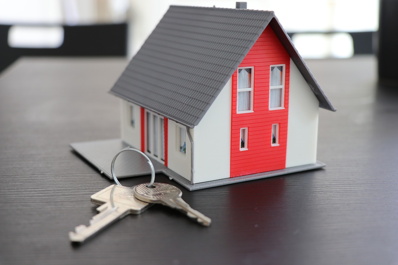 Image of a home with keys laying on table.